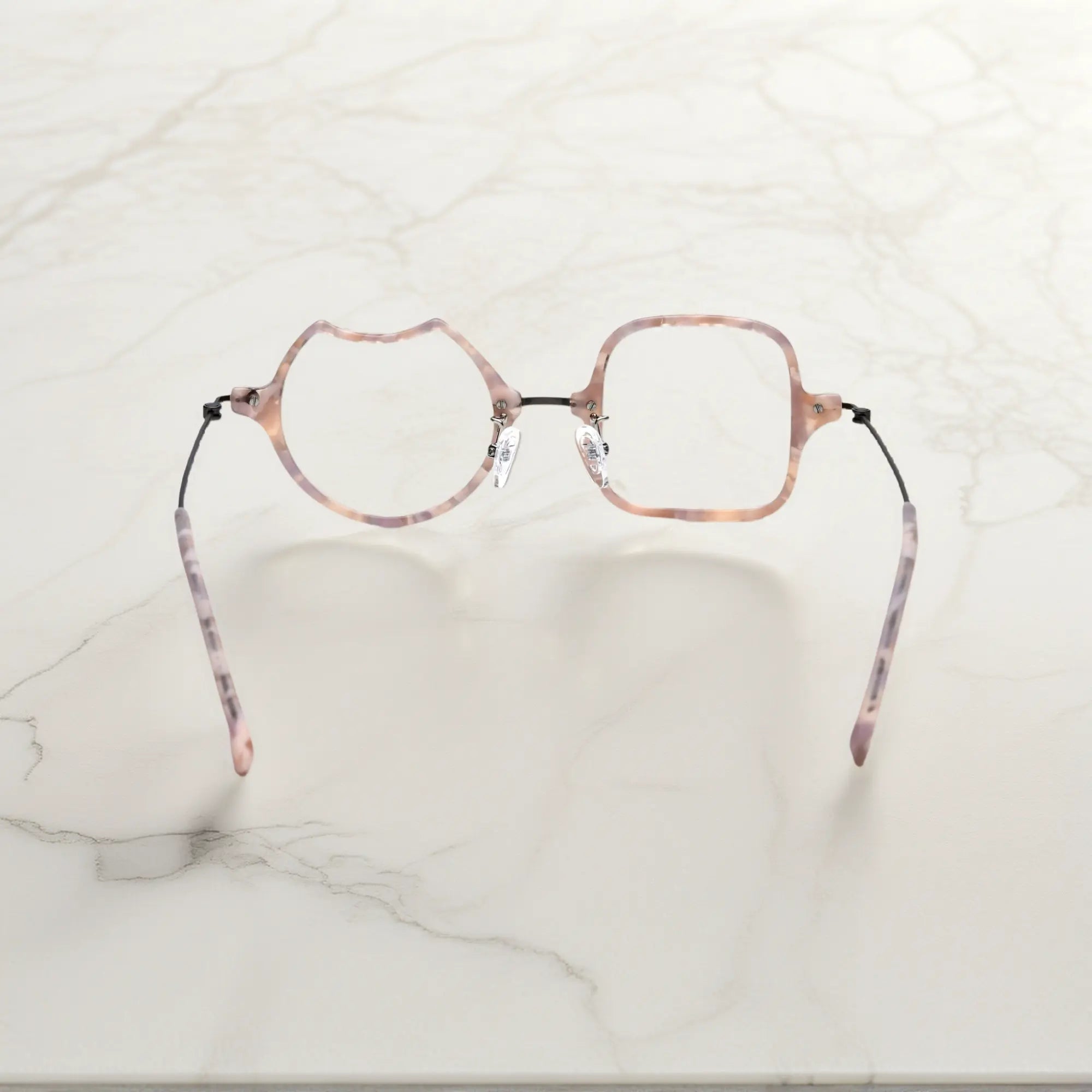 Back View of VoyueLens™ Shell Pink dual-shaped artistic eyeglasses VL185842-C3. Rear view displaying the acetate frame and the titanium temple connection structure.